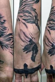 Wrist drama style black gray crow and feather tattoo pattern