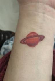 girl wrist on red gradient geometric line planet tattoo picture