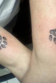 paw print couple tattoo pattern on wrist