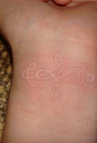 wrist white ink invisible totem tattoo pattern