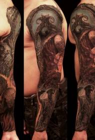 grootarmkleur van verskillende monster-tatoo-ontwerpe