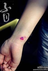 girl wrist small love tattoo pattern