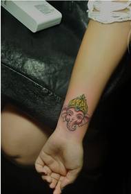 wrist can be seen the little elephant god tattoo pattern picture
