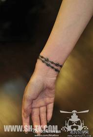 girl's wrist small trend bracelet tattoo pattern