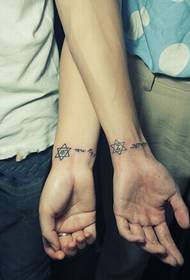 Wrist beautiful couple totem tattoo