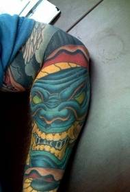 arm scary blue smiley monster tattoo pattern