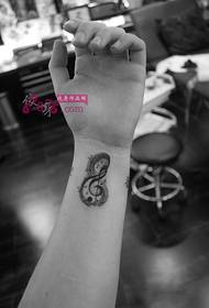 black and white note wrist personality tattoo