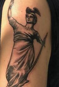 Statue of Liberty arm tattooed male arm on the black Statue of Liberty tattoo picture