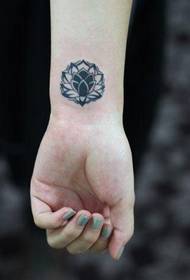 simple and beautiful wrist totem tattoo