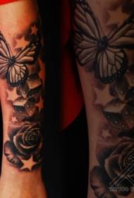 arm black and white butterfly with braid and rose tattoo pattern