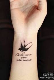 girl swallows small swallows with letter tattoo pattern