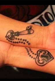 a beautiful wrist tattoo couple