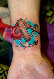 a beautiful anchor tattoo on the wrist