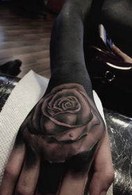 female arm full black rose tattoo pattern