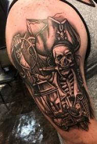 tatuaxe de cráneo, brazo do neno, foto de bosquexo de tatuaxe de cráneo