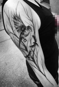 Schoolgirl arm on black sketch creative twig and bird tattoo picture