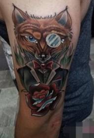 Boy's arm on painted animal sting trick fox tattoo picture