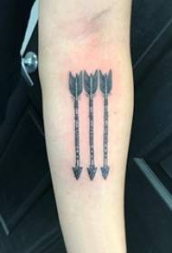 Girl arm on black prick geometric simple line arrow tattoo picture