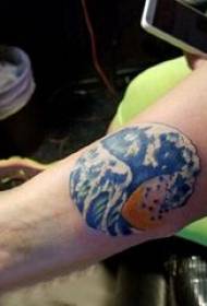 Tattoo surf boy's arm on colored wave tattoo picture