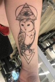 Girl's arm on black gray point tattoo geometric line god eye and owl tattoo picture