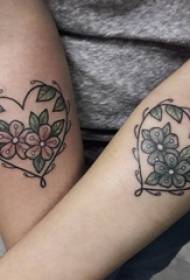 Couple arms painted watercolor heart shaped element flower tattoo picture