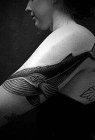 Girl arm on black sketch pricking technique animal whale tattoo picture