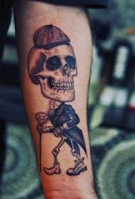 Arm татуировка материал ръка на момче на черен череп татуировка снимка