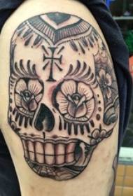 Boy's arm on black gray sketch point thorn skill creative beautiful pattern skull tattoo picture