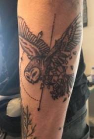 Schoolboy arm on black line geometric element bird tattoo picture