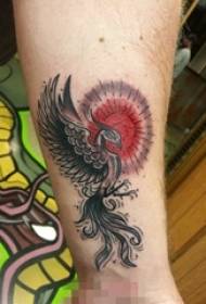 Boys' arms on black and gray thorns tips phoenix and red day tattoo pictures