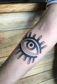 Boy's arm on black gray pricking technique eye tattoo picture
