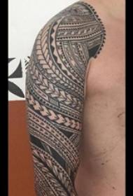 Tribal totem tattoo male student arm on tribal totem tattoo picture