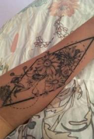 Girl arm on black line geometric element beautiful flower tattoo picture