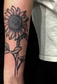 Schoolgirl arm on black thorn abstract line plant sunflower tattoo picture