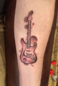 Arm tattoo material, boy's arm, black gray guitar tattoo picture