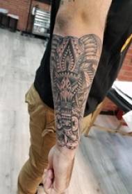 Elephant tattoo boy's arm on black elephant tattoo picture