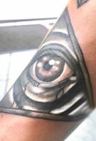 Tatuaxe de ollos, brazo de rapaz, foto de tatuaxe de ollos