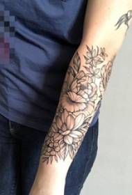 Girl's arm on black gray line flower group tattoo picture