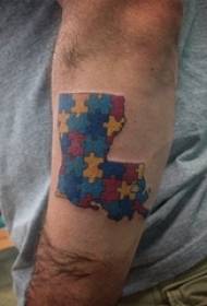 Arm tattoo material, male hand, colored puzzle tattoo picture