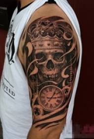 Schoolboy arm on black sketch creative personality skull and pocket watch tattoo picture