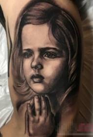 Schoolboy arm on black gray sketch technique praying girl character tattoo picture