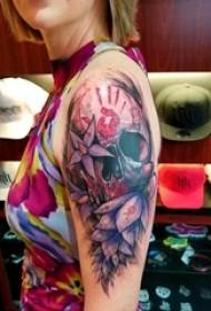 Girl's arm painted on gradient simple lines flowers and skull tattoo pictures
