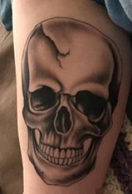 Boy's arm on black gray pricking technique geometric element skull tattoo picture