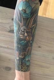 Pojkar armmålade akvarell skissar söt kanin blomma arm tatuering bild