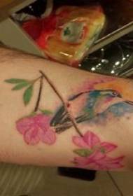 Arm tattoo material, male flower, bird and tattoo picture