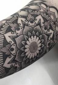Brahma tattoo, boy's arm, black and gray tattoo, vanilla picture