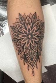 boys calves on black stings simple lines geometric flower tattoo pictures