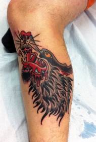 Foto de tatuaje de pierna vieja escuela lobo de color