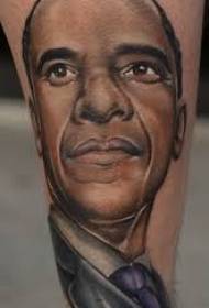 腿現實主義風格的彩色巴拉克·奧巴馬肖像紋身