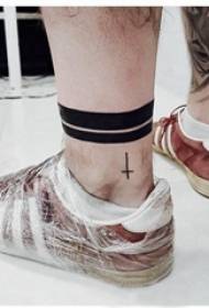 calf symmetrical tattoo male shank on black cross tattoo picture